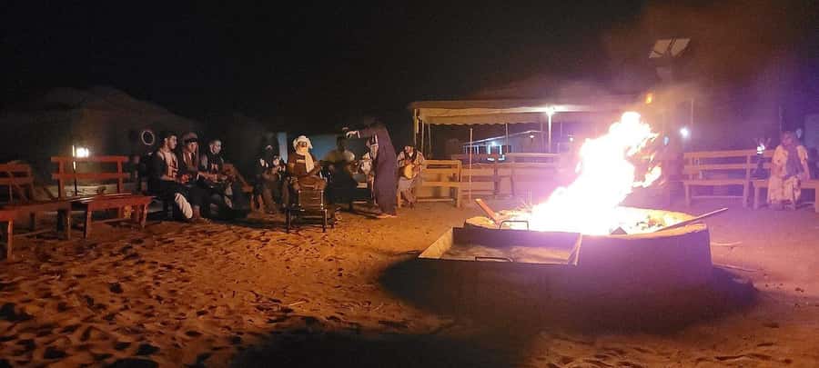 2-Day Luxury Excursion from Marrakech to the Zagora Desert - Camelback at sunset in the Zagora desert
