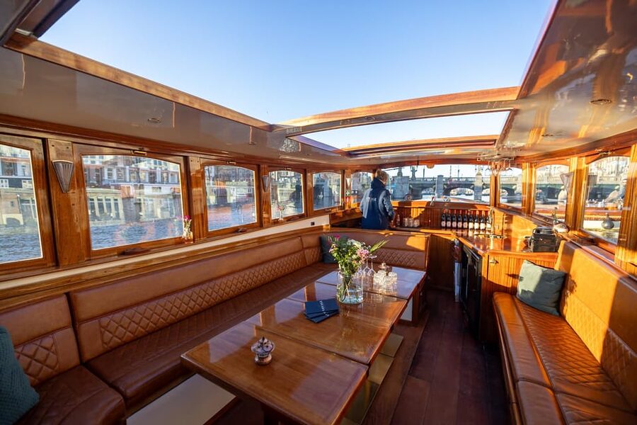 Amsterdam: 2-Hour Luxury Canal Cruise with Snacks & Drinks - Daylight, dusk, and rainy weather