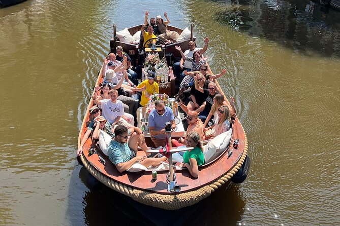 Amsterdam Luxury Boutique Boat tour with Unlimited Beer and Wine - Starting near De Wallen and the old canals