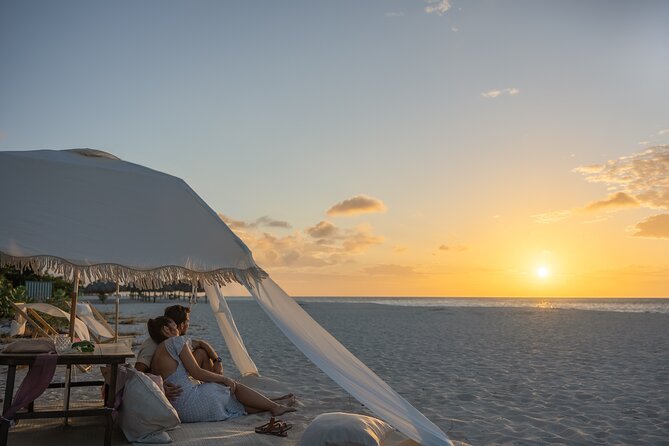 Aruba Romantic Sunset Photoshoot & Beach Picnic in Luxury Cabana - Moving from the cabana to the beach umbrella