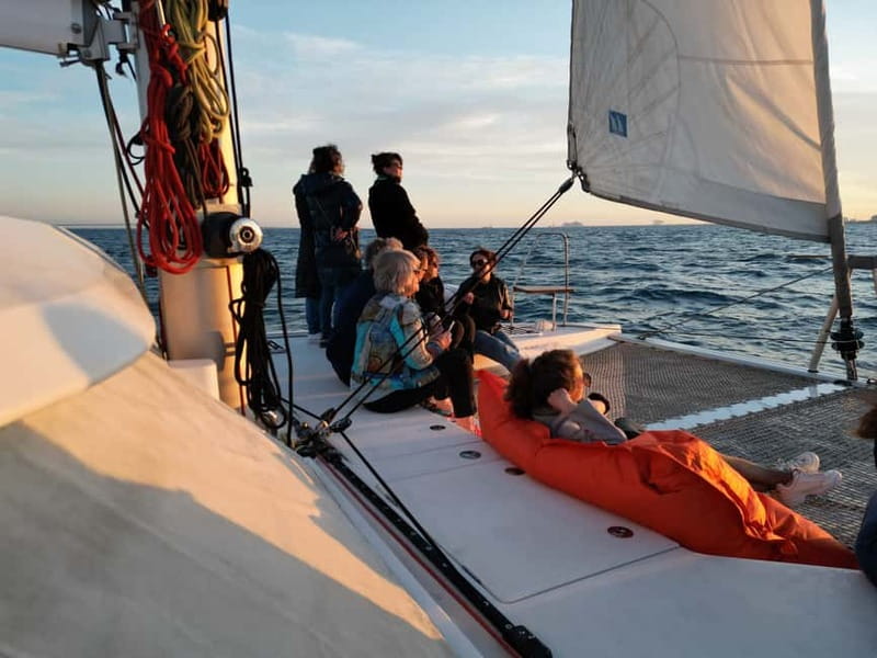 Barcelona: Luxury Catamaran Sunset Cruise - Sailing out with the sails raised