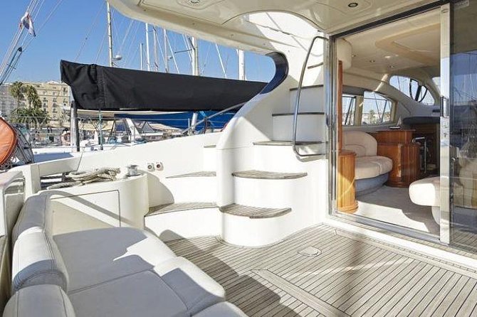 Barcelona Private Luxury Yacht Tour - A swimming stop with paddleboard and snorkeling gear