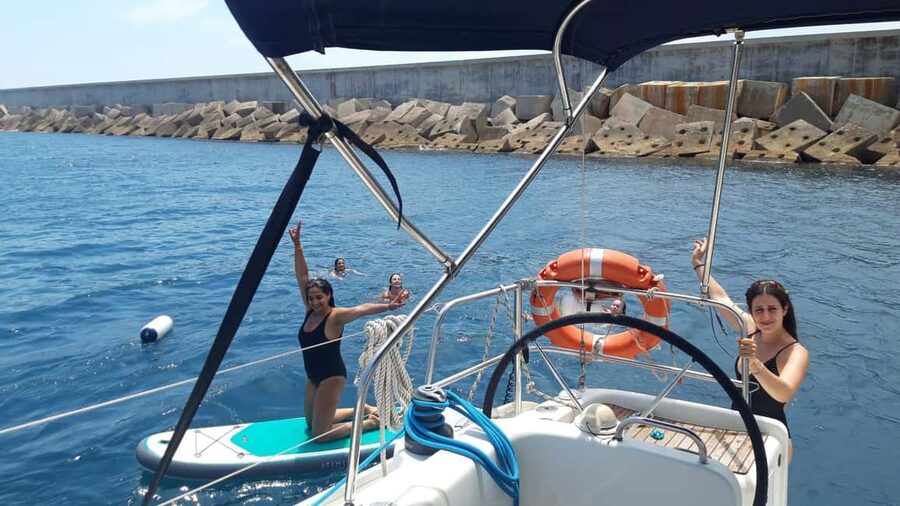 Barcelona: Shared cruise on luxury catamaran Drinks + Snacks - La Merce and Hotel Florida