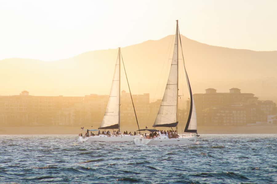 Cabo Luxury Sunset Sailing Adventure with Open Bar - The old lighthouse, El Arco, and Lovers Beach