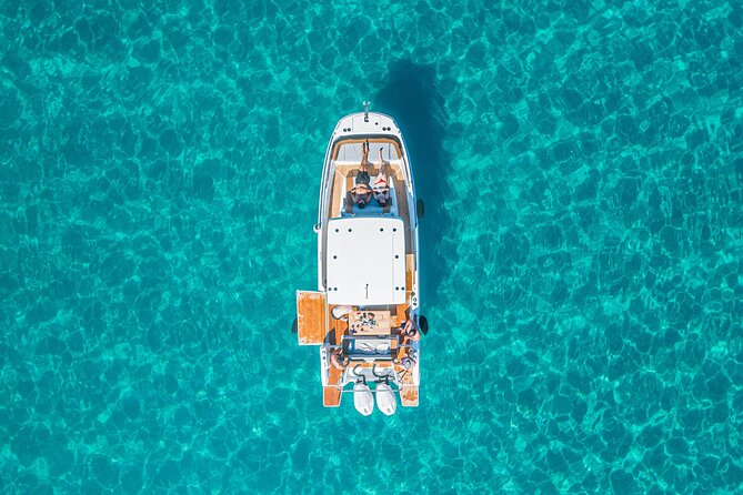 Cagliari 3 Hours Luxury Motorboat Tour - Wine and Snorkeling - Leaving Poetto Beach for Sella del Diavolo