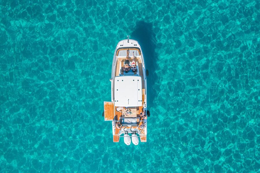 Cagliari: Luxury Motorboat Tour with 3 Swim Stops & Wine - Cala Fighera and the best time in the water
