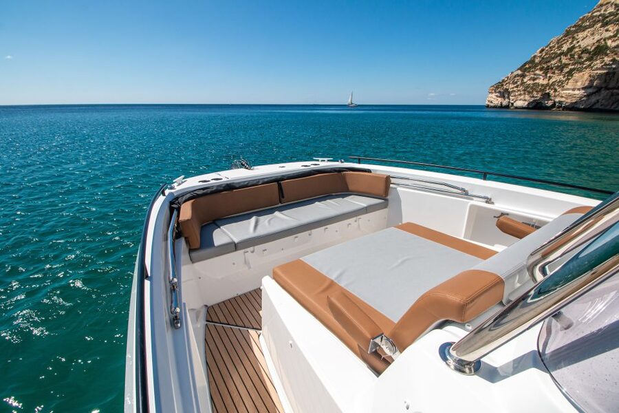 Cagliari: Luxury Motorboat Tour with 3 Swim Stops & Wine - What the captains add to the experience