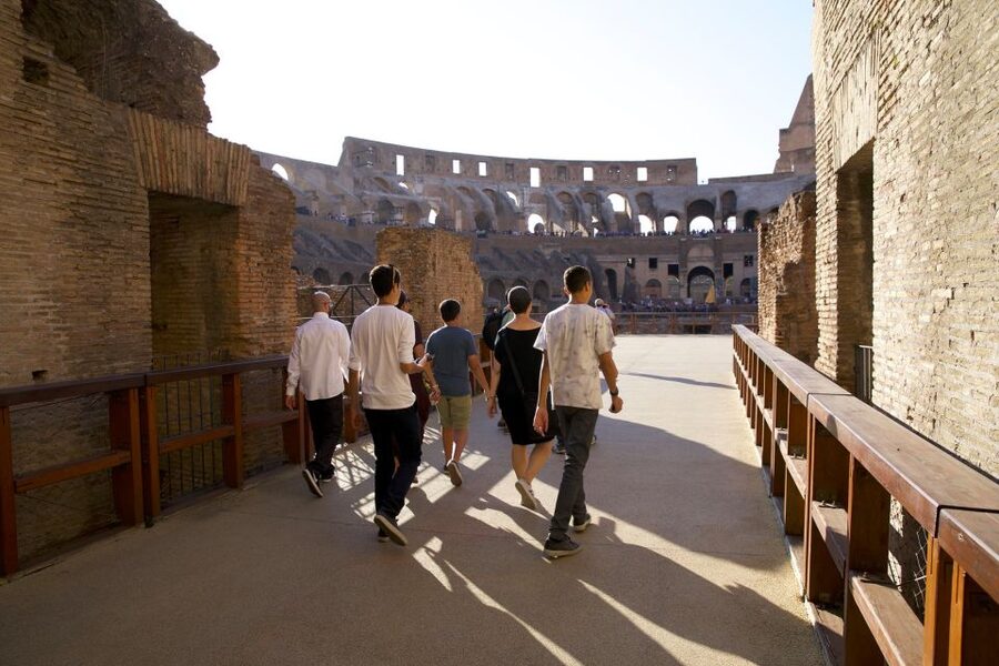 Colosseum: Semi Private Tour with VIP Arena Access - Walking onto the reconstructed Arena