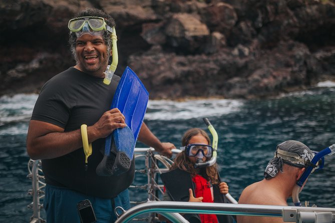 Deluxe Snorkel & Dolphin Watch Aboard a Luxury Catamaran from Kailua-Kona - Slides, high jumps, paddleboards, and easygoing water time