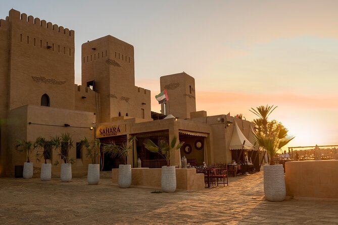 Desert Safari: Luxury Fortress Dinner, Camel Ride & Dune Bashing - Entering Al Sahra Desert Fortress after sunset