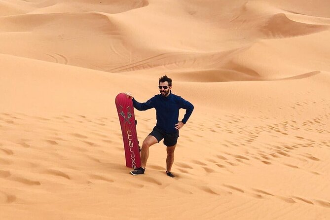 Desert Safari Tour with Camel Ride and BBQ Dinner in VIP Camp - The red dunes and 30 to 40 minutes of dune bashing