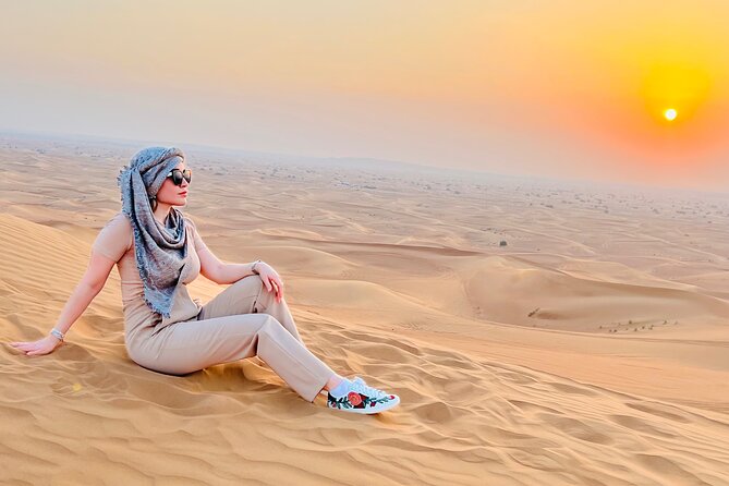 Desert Safari Tour with Camel Ride and BBQ Dinner in VIP Camp - The camel ride, henna, and Arabic clothing