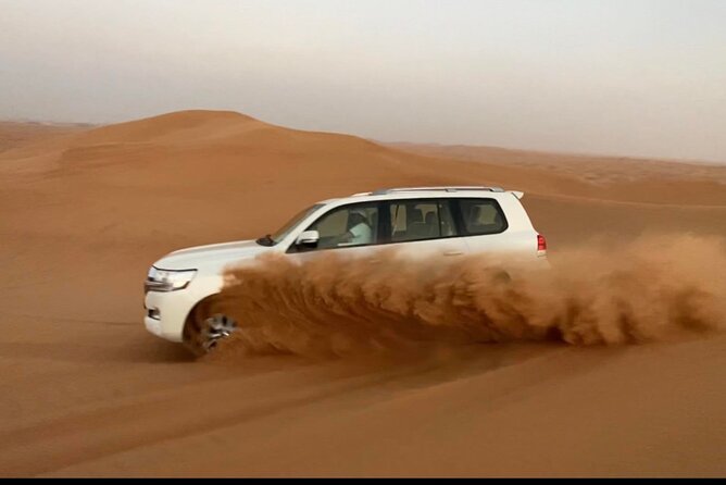 Desert Safari Tour with Camel Ride and BBQ Dinner in VIP Camp - The ride from Dubai to Lahbab