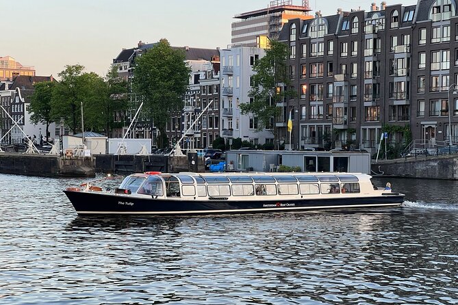 Discover Amsterdam: Luxury Canal Cruise with a Local Skipper - Passing the Anne Frank House and Westerkerk