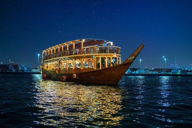 Dubai Creek Luxury Dhow Dinner Cruise with Optional Transfer - Boarding a traditional dhow, with realistic expectations