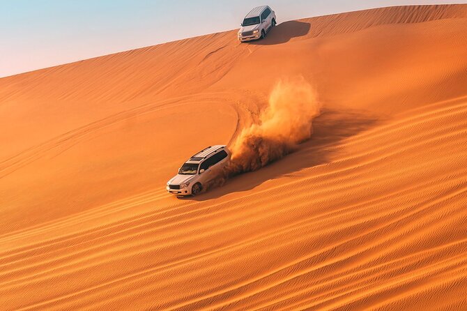 Dubai Evening 4x4 VIP Desert Safari ,Table Service BBQ Dinner - Entering the Bedouin-style camp after sunset