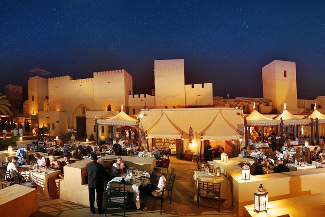 Dubai: Luxury Desert Fortress Dinner, Camel Ride & Live Shows - From Dubai hotels to the desert