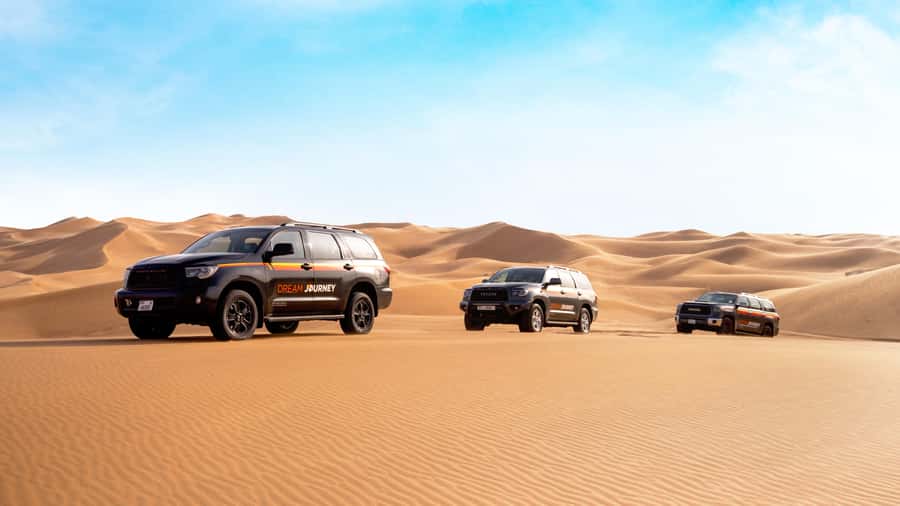 Dubai Waves & Dunes: Luxury Yacht Cruise w/ Red Dunes Safari - From hotel pickup to Lahbab’s red sand