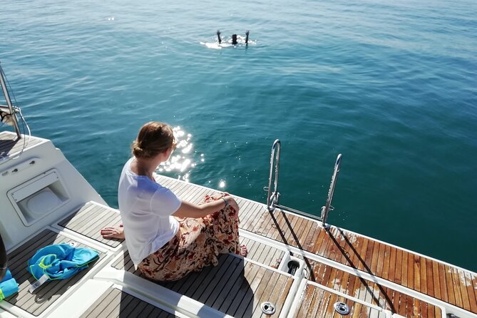 Exclusive Barcelona Private Luxury Sailing Cruise with Open Bar - Passing the Old Fortress by Sea