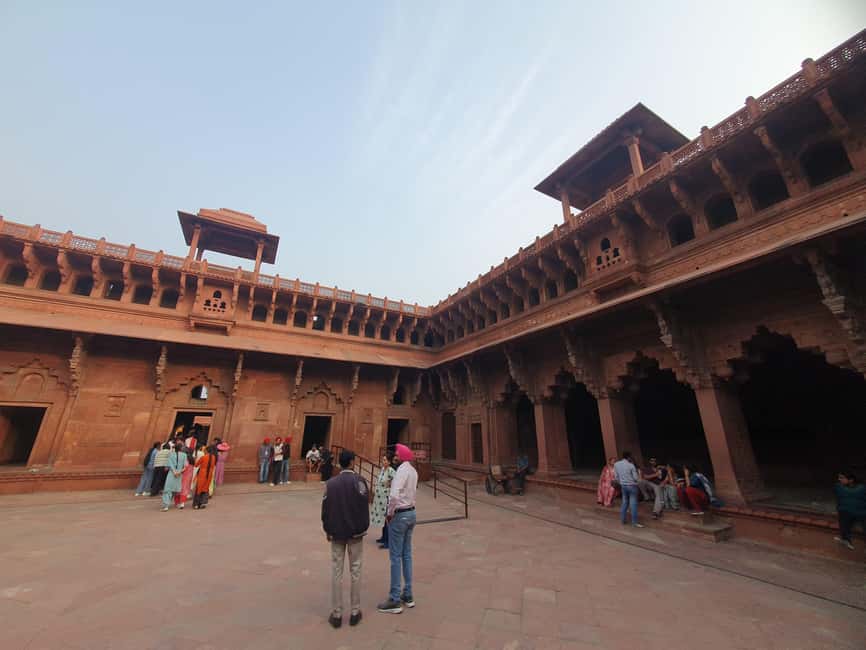 From Delhi: Deluxe Taj Mahal and Agra tour with Luxury Cars - The guides and photography service