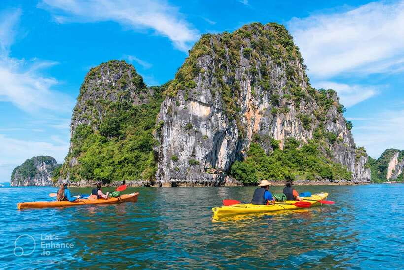 From Hanoi: Ha Long Bay Luxury Cruise with Big & Small Group - Boarding at Tuan Chau Island around noon