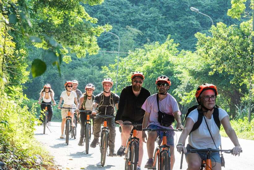 From Hanoi: Trang An, Hoa Lu & Mua Cave Full-Day Luxury Tour - Cycling through villages and rice fields
