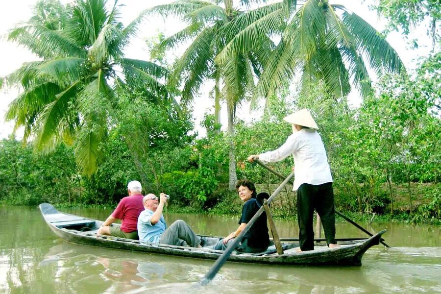 From Ho Chi Minh City: Mekong Delta VIP Tour by Limousine - Coconut Island and the village welcome