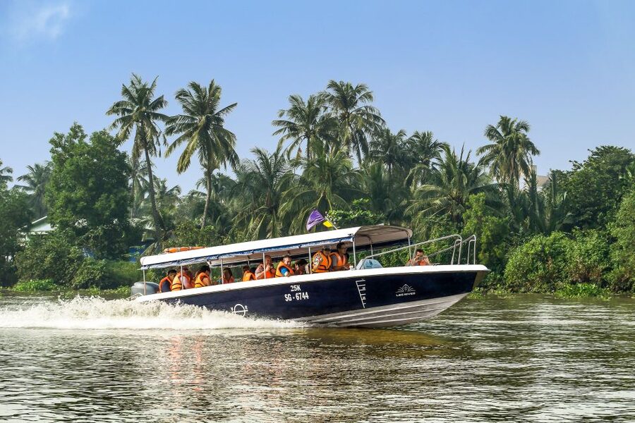 From Ho Chi Minh: Cu Chi Tunnels and VIP Speedboat Tour - Hotel pickup in Districts 1 and 3