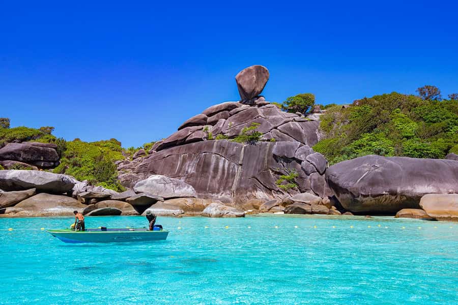 From Khao Lak: Similan Islands Day Trip by Luxury Catamaran - Food, drinks, and the return to Thap Lamu