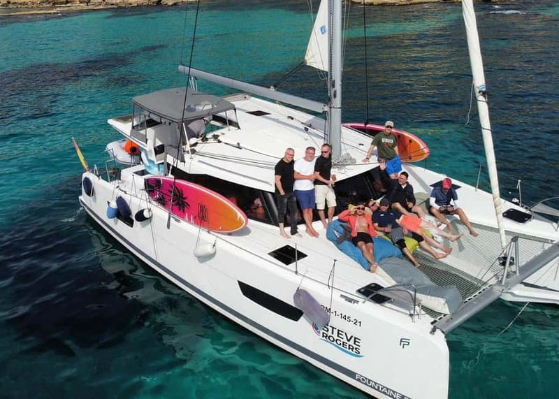 From Palma: Luxury Catamaran Group Tour with Tapas & Drinks - Tapas, welcome drinks, and extra orders