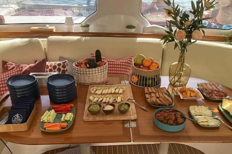 From Palma: Luxury Catamaran Group Tour with Tapas & Drinks - Sailing away from Palma