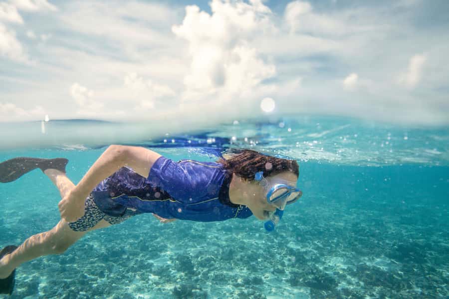 From Port Douglas: Outer Reef Cruise by Luxury Catamaran - First reef stop: guided snorkeling at Mackay Cay