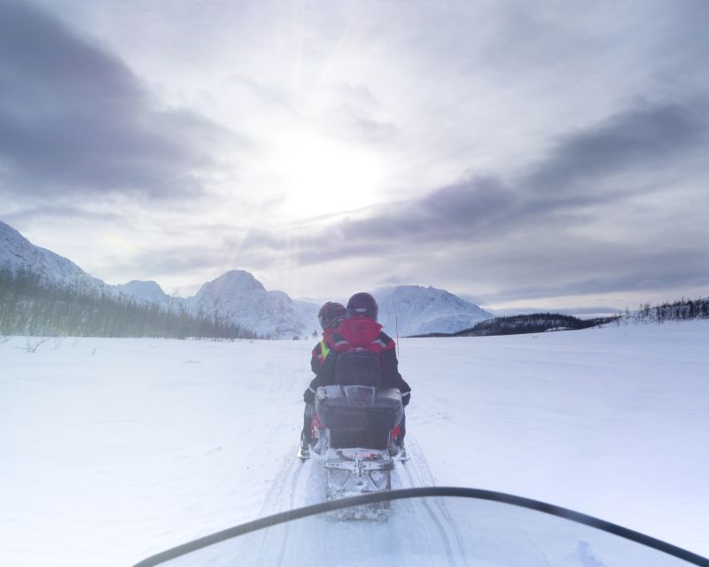 From Tromso: Eco Luxury Snowmobile Adventure to Lyngen Alps - The cabin, fire, soup, and driver swap