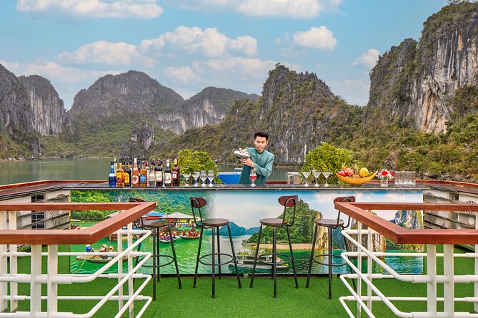 Full Day Halong Bay Luxury Limousine Bus & Buffet Lunch - Titop Island for swimming or a panoramic view