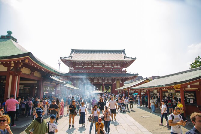Full Day Tokyo Private Tour by Luxury Vehicle - Akihabara shifts the mood from temple bells to neon