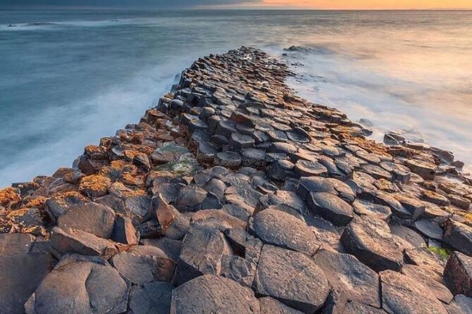 Giant's Causeway Private Tour from Belfast in Luxury Mercedes - Dunluce Castle and White Park Bay: ruins and open coast