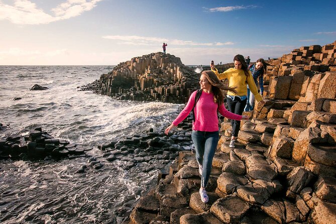 Giant's Causeway Tour from Belfast - Luxury Bus + Castles Tour - Carrickfergus Castle starts the history lesson