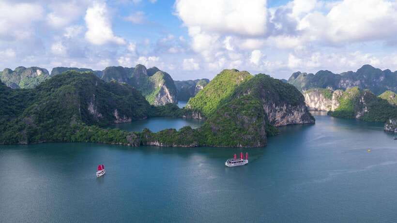 Ha Long Bay - Bai Tu Long Bay Luxury Boat Tour & Transfer - Titop Island for views and swimming