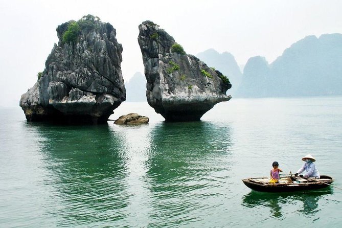 Halong Bay Full Day with Kayaking, Hiking viewpoint, Cave - Deluxe To Luxury - Kayaking or a bamboo boat through the bay