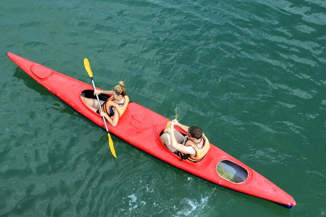 Halong Luxury Cruise 2D/1N: Kayaking, Swimming, Titop island, meals, best prices - Day two: tai chi, a grotto, and the return cruise