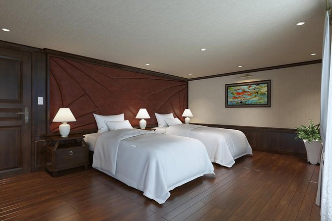 Halong Luxury Cruise 2D/1N: Kayaking, swimming, Titop island, Surprise cave - Boarding at noon and settling into the private cabin