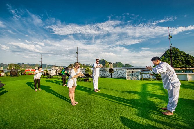 Halong Luxury Cruise 2D/1N: Kayaking, swimming, Titop island, Surprise cave - Dinner, tai chi, and onboard activities