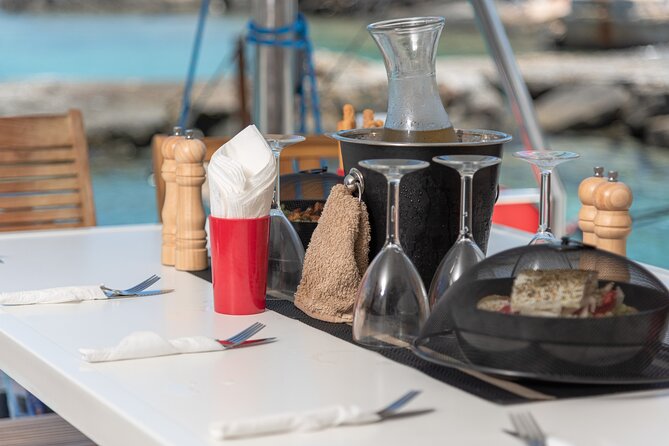 Hersonissos: Luxury Sunset Catamaran Cruise Sushi & Open Bar - Sushi, Cretan drinks, and a practical meal