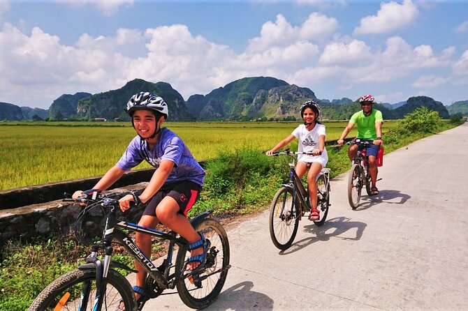 Hidden Ninh Binh Luxury Full Day Group Tour (Tam Coc - Hoa Lu) - Cycling through rice fields and limestone country
