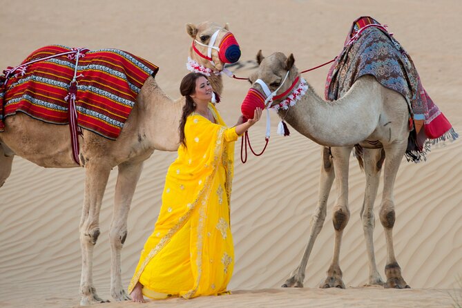 High Red Dunes with Camel Ride, Sandboarding, Falcon Show and VIP BBQ Dinner - Sunset seating and the camel ride