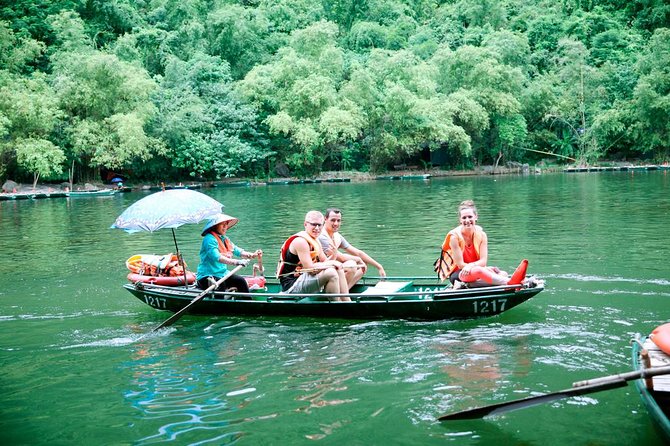 Hoa Lu - Tam Coc Luxury Small group 1D: Limousine bus, biking, boat trip, Lunch - Tam Coc by bamboo sampan