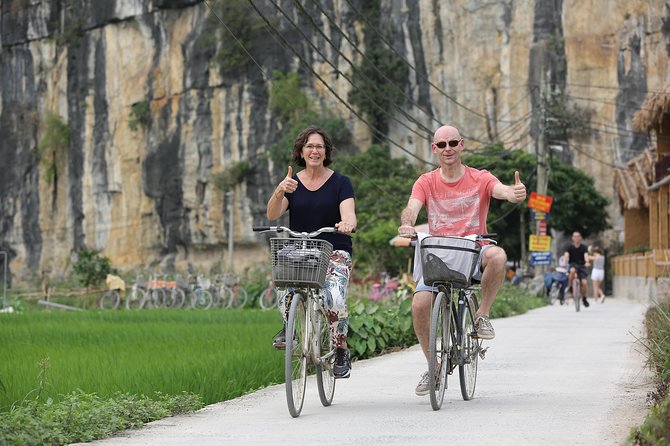 Hoa Lu - Tam Coc Luxury Small group 1D: Limousine bus, biking, boat trip, Lunch - Cycling through Ninh Hai Village and rice fields