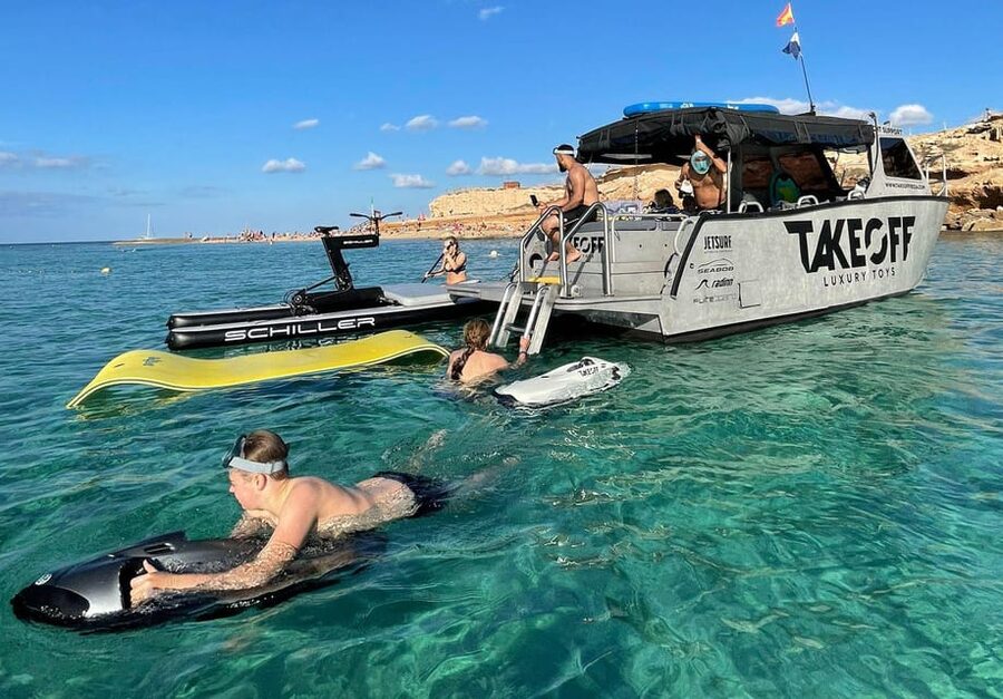 Ibiza: Beach and Cave Boat Tour with Luxury Water Toys - The secluded cove and sea caves
