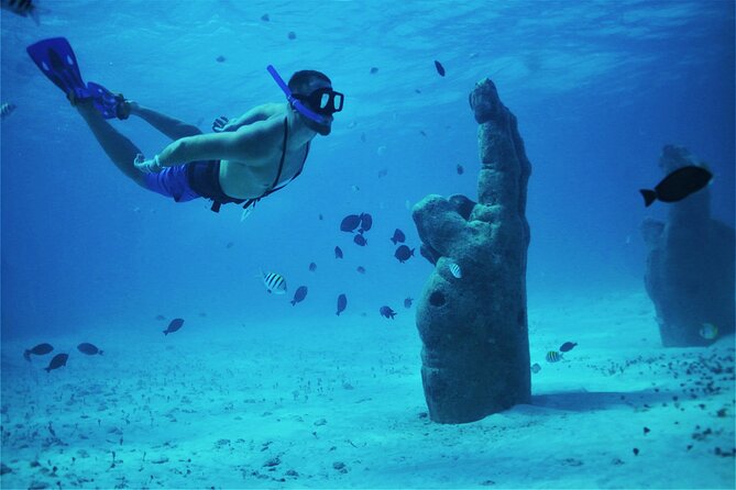 Isla Mujeres Luxury Sailing: Adults Only or Family Friendly - Isla Mujeres: pretty water, busy port energy