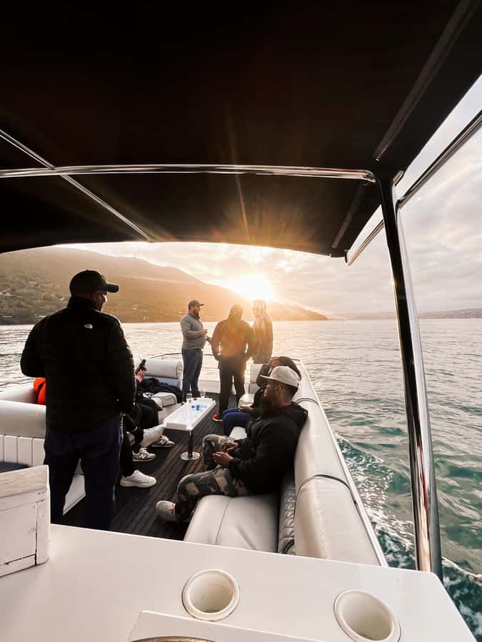 Knysna: Wine & Oyster Luxury Lounger Sunset Cruise - Watching the Knysna sunset from a lounge cruiser